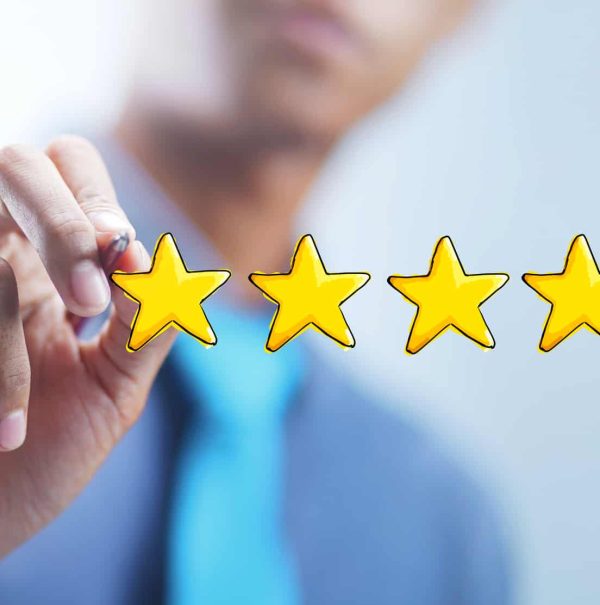 Asian Businessman Drawing 5 out of 5 Stars. Excellent or Perfect Review Concept for After Sales Nurturing